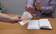 В Узловой пенсионер пытался подкупить полицейского, выгораживая бывшую жену